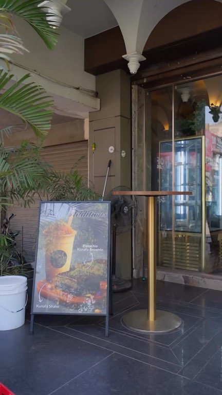 Reel: walking into Bell’s, past the dessert cabinet and the cone display