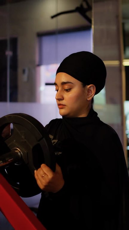 Reel: a member loading a plate and working through the machines