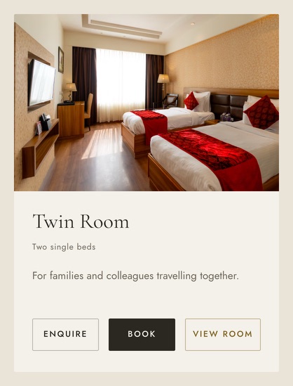 The Twin Room&rsquo;s card on the hotel&rsquo;s home page: two single beds, For families and colleagues travelling together, and the buttons Enquire, Book and View room.